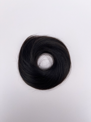 Very dark brown hair bun
