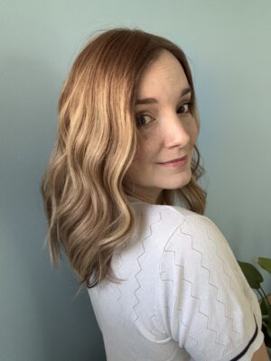 Thehair  topper  is made of natural hair. It is a golden blonde shade accented with subtle light blonde highlights.