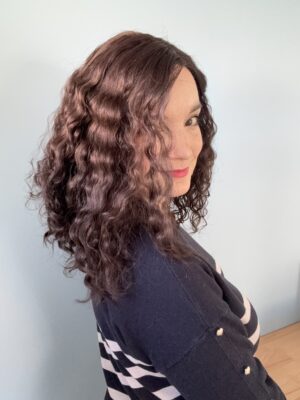 Dark brown curly human hair wig for alopecia and hair loss. A solution for thinning hair.