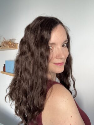 Dark chocolatehair topper  with subtle highlights, made from natural Brazilian hair. A solution for hair loss, thinning hair, or fine hair.