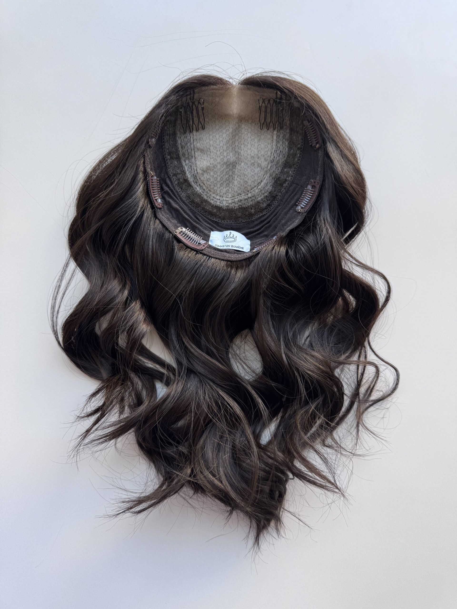 Darkhair topper made from natural Brazilian hair. A solution for hair loss, thinning hair, or fine hair.