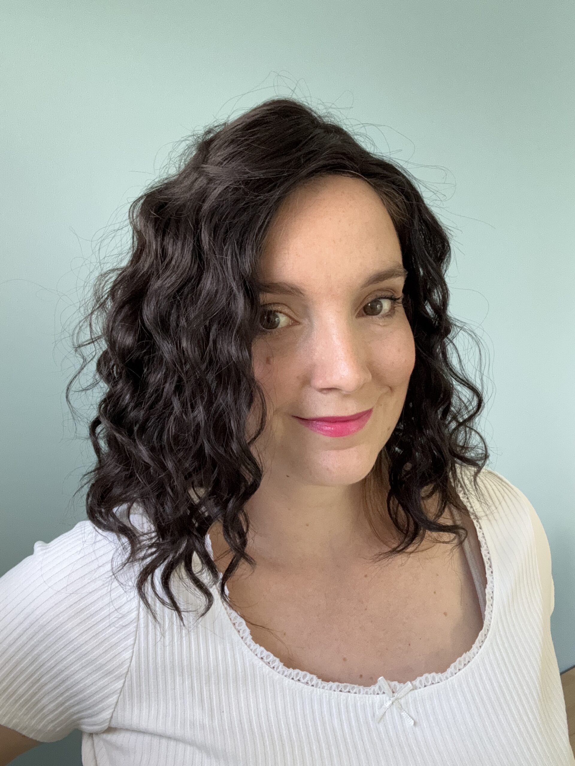 Darkhair curlyhair topper made from natural hair. Ideal for alopecia, fine and thinning hair, or lack of density.