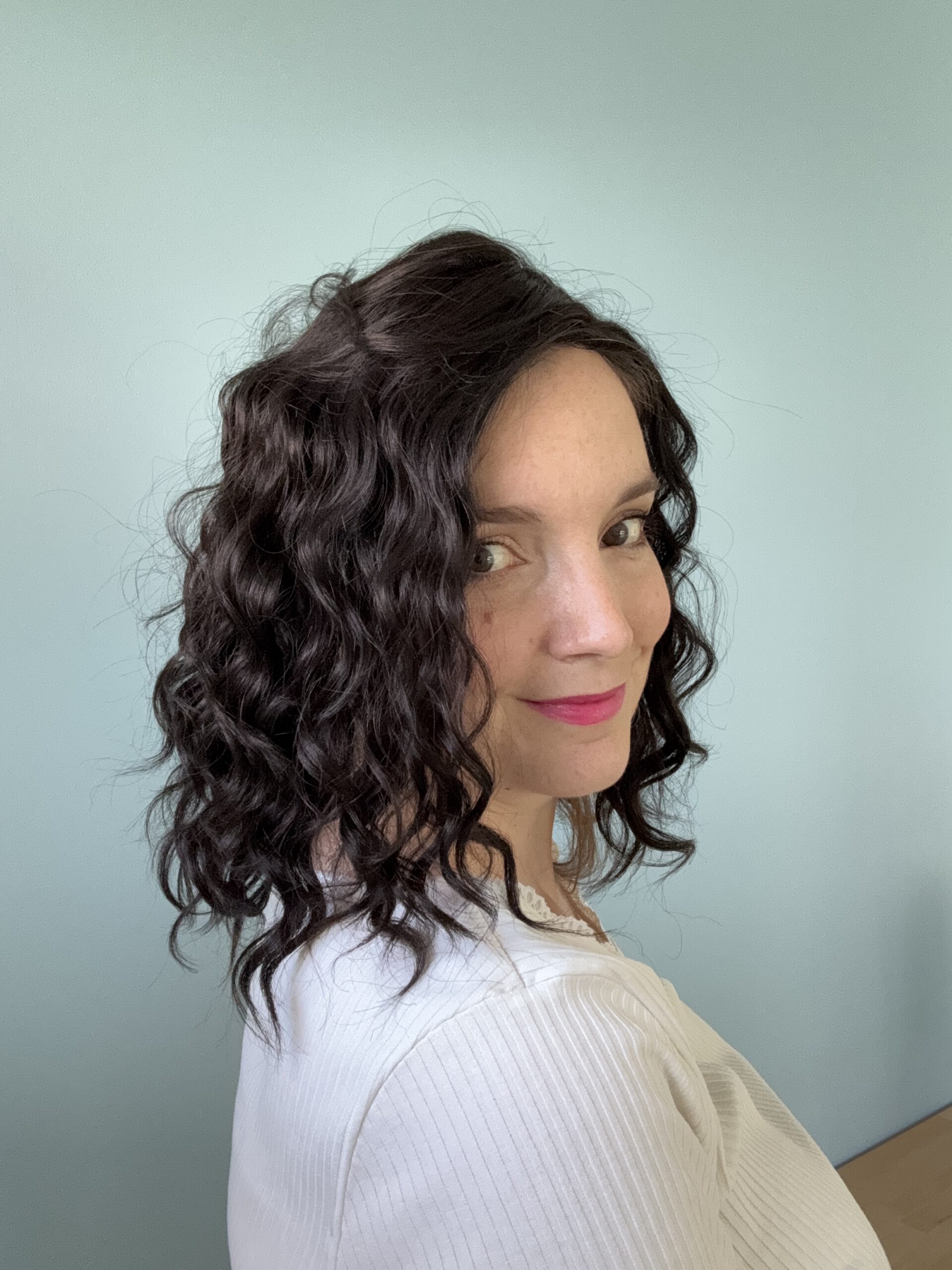 Darkhair curlyhair topper made from natural hair. Ideal for alopecia, fine and thinning hair, or lack of density.