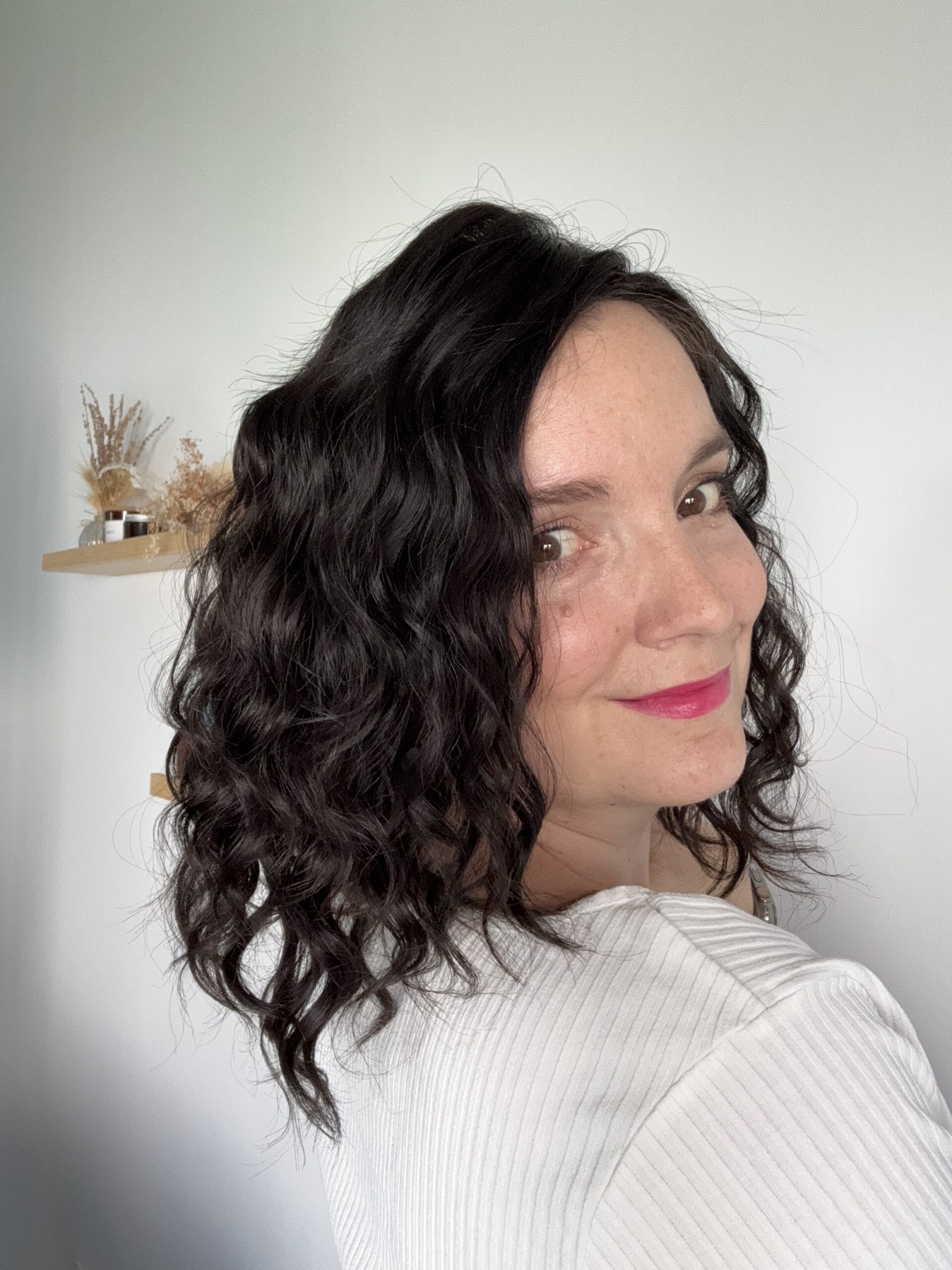 Darkhair curlyhair topper made from natural hair. Ideal for alopecia, fine and thinning hair, or lack of density.