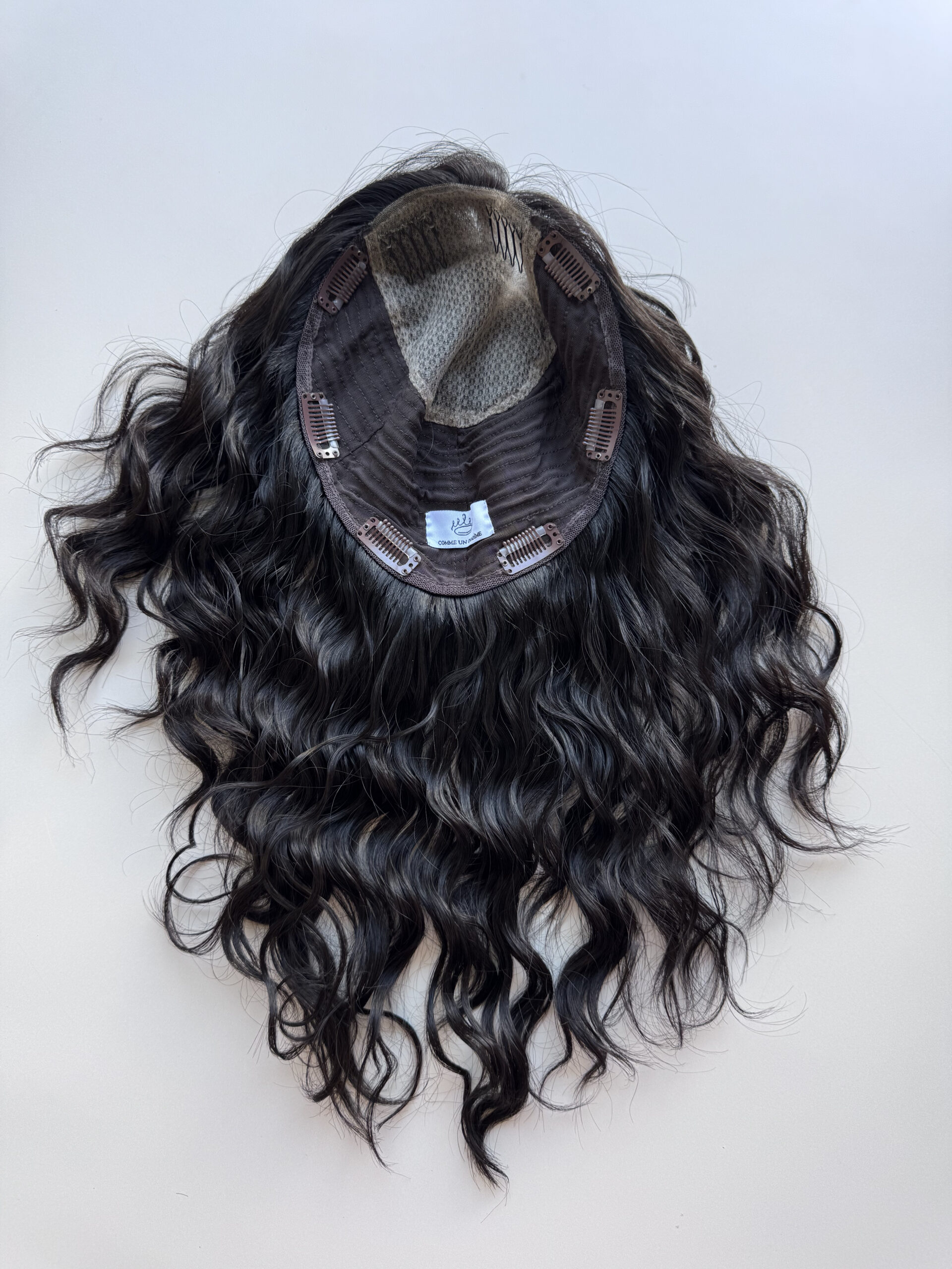 Darkhair curlyhair topper made from natural hair. Ideal for alopecia, fine and thinning hair, or lack of density.