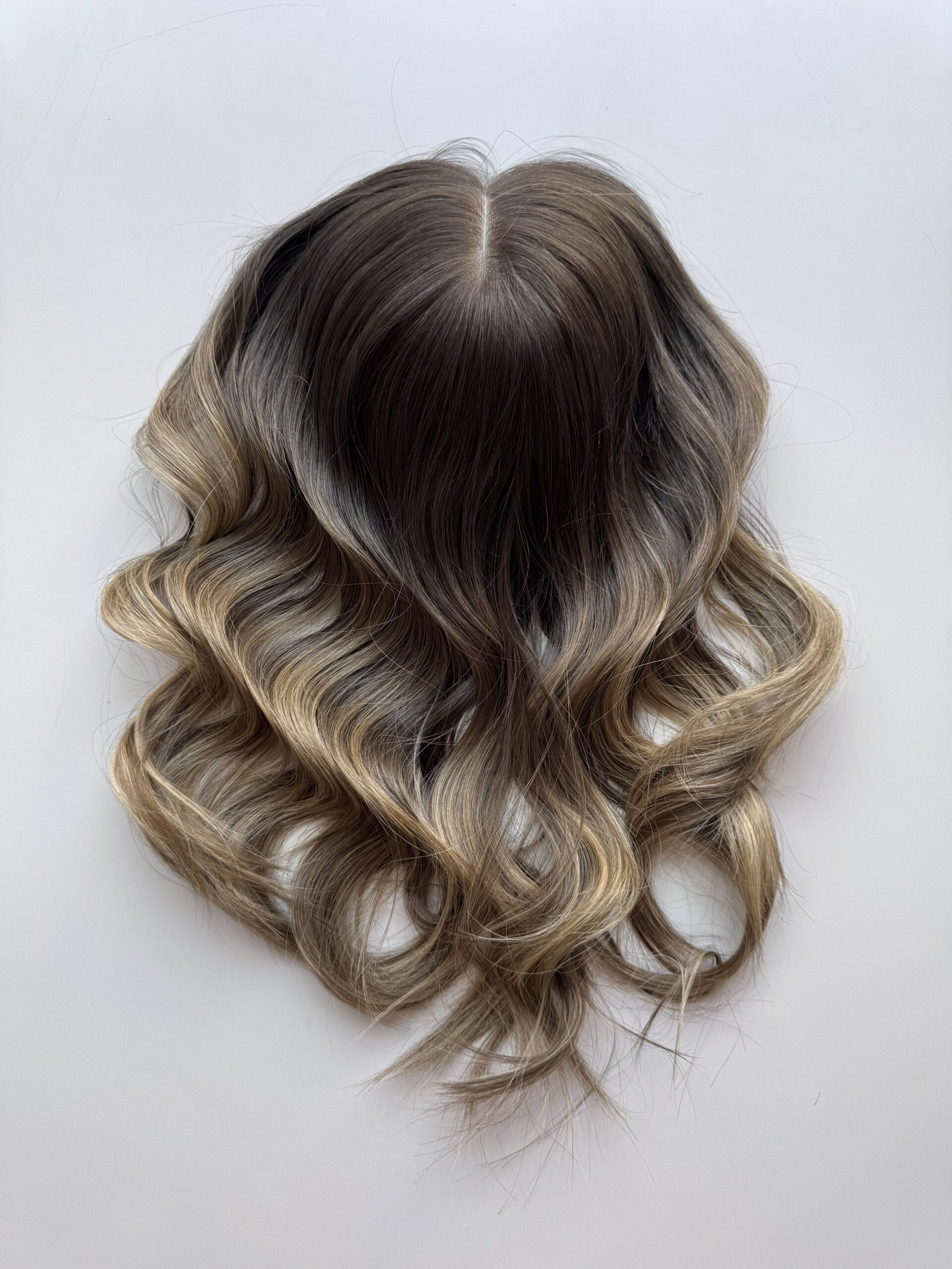 hair topper for androgenetic alopecia, dark brown ombré with light blonde lengths.